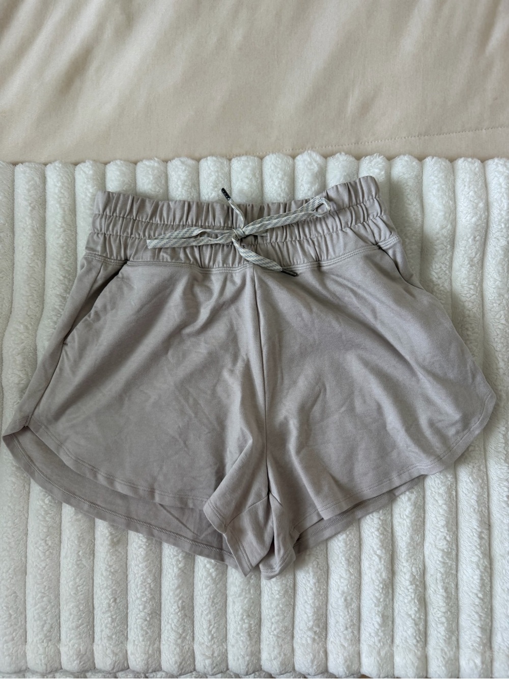 Vuori Relaxed Drawstring Athletic Shorts in Taupe